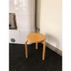 Stool 60 Stool 60 - drie poten, stapelbaar, honingkleurig gebeitst